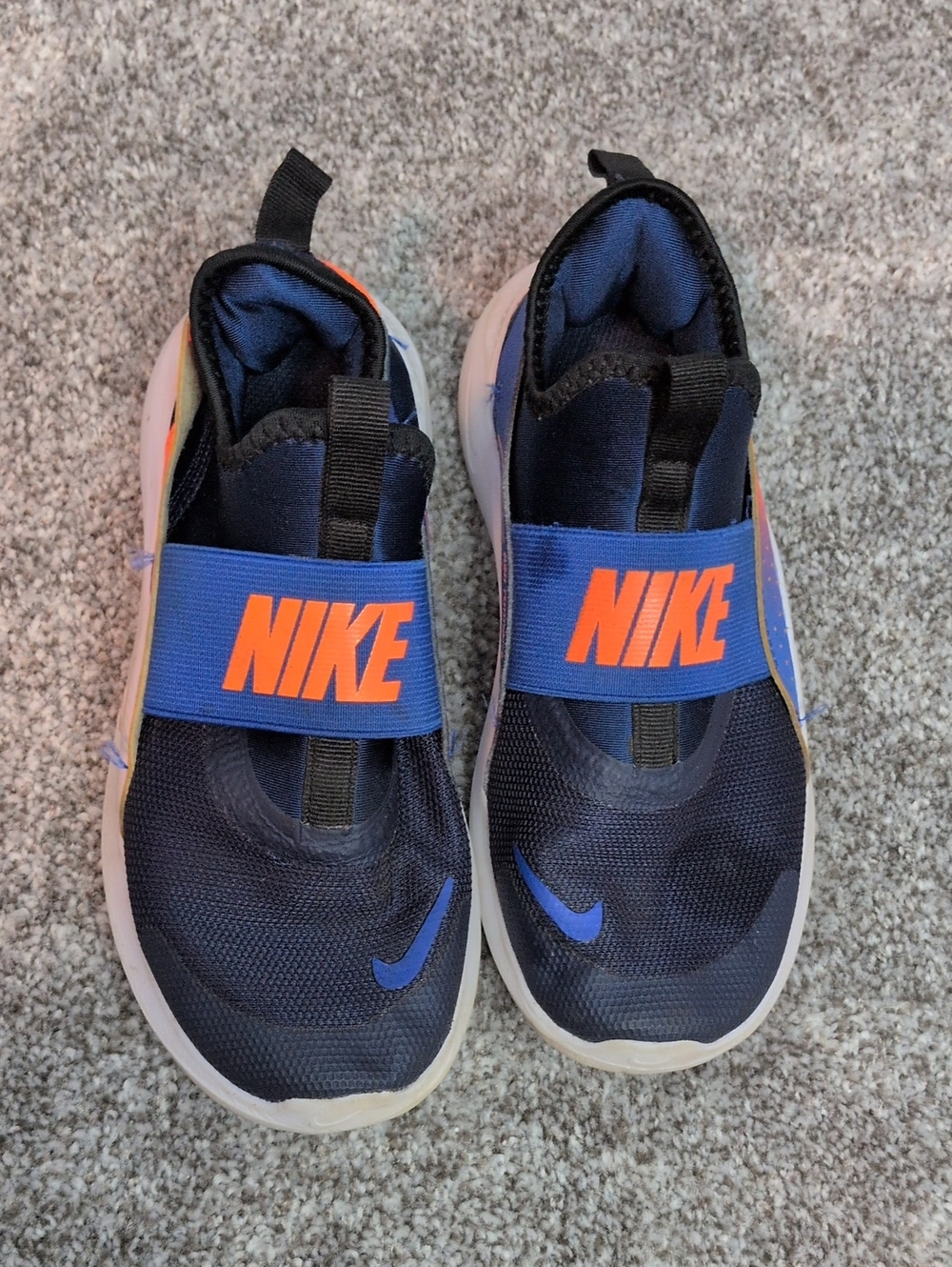 Nike Kids Slip-On Sneakers in Navy and Orange